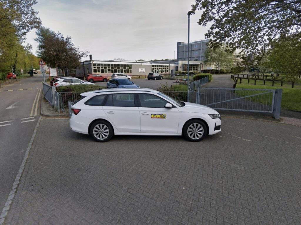 Taxi outside a school
